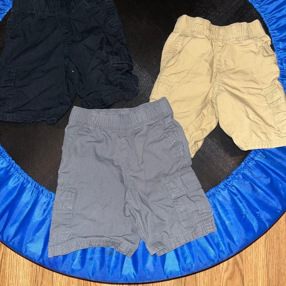 Black, khaki and grey knee-length cargo shorts